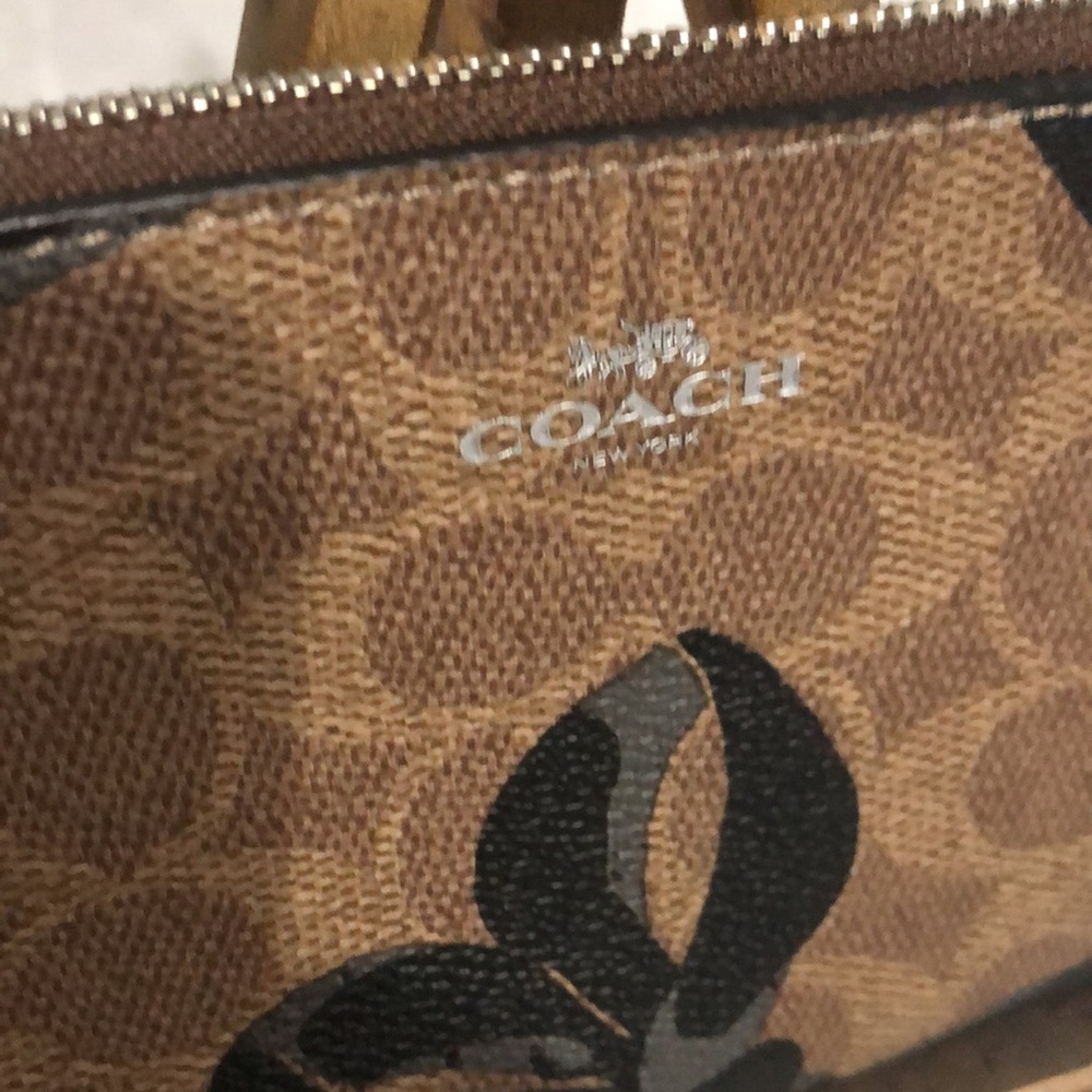 Coach Brown Signature Floral Wristlet with Black Trim - Picture 2 of 9